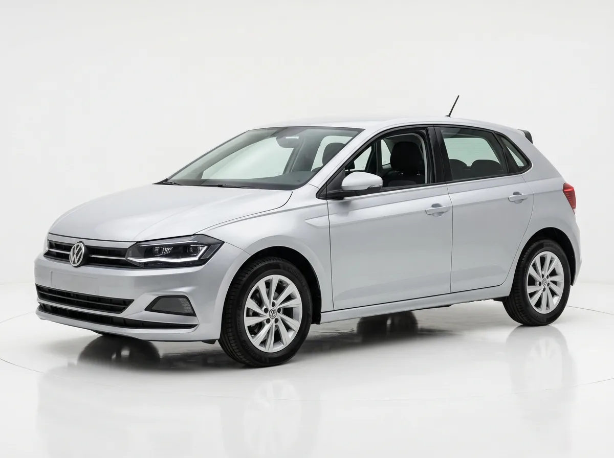 Economy hatchback car, silver, front three-quarter view, clean white studio background, compact city vehicle